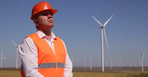 Master Engineer Check Wind Turbines Farm Field System Man Work Looking Up Verify Stock Footage 54525993
