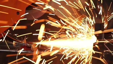 A master engineer is cutting metal on a circular saw Stock Footage 237155654