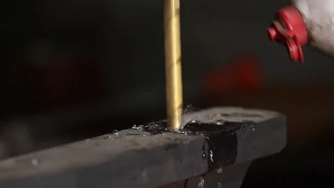 A master engineer is drilling steal on a drilling machine Stock Footage 237155707