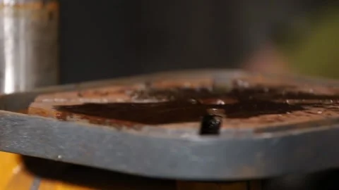 A master engineer is drilling steal on a drilling machine Stock Footage 237155756