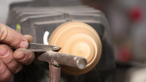 A master engineer processes a wooden detail on a machine tool Stock Footage 237156172