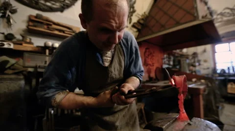 Master in the forge produces forged metal products Stock Footage