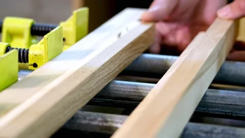 The master goes through the boards for better gluing Stock Footage 183989625