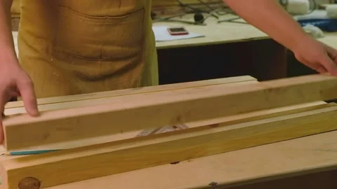 The master goes through the boards selects one and takes measurements Stock Footage 182228379