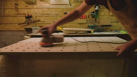 The master grinds a large surface with a grinding machine Stock Footage 182223974