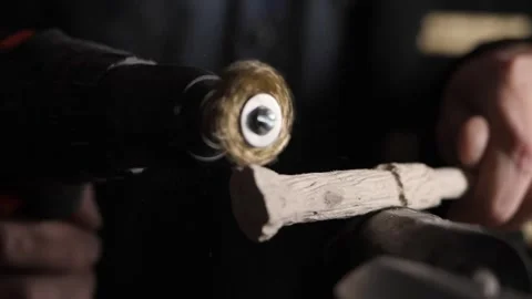 The master grinds the pattern on wood Stock Footage 255805925