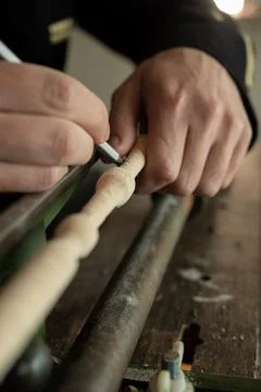 The master grinds a pattern on wood Stock Photos