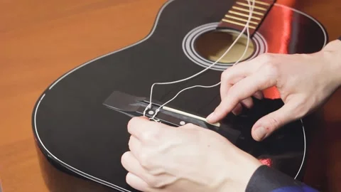 Master hand tuner classical guitar ,repair of musical instruments Stock-Footage 234712010