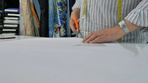 Master hands while sewing new clothes Stock Footage 94157124
