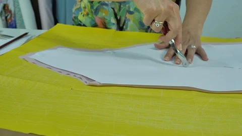 Master hands while sewing new clothes Stock Footage 94157626