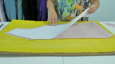 Master hands while sewing new clothes Stock Footage 94157722