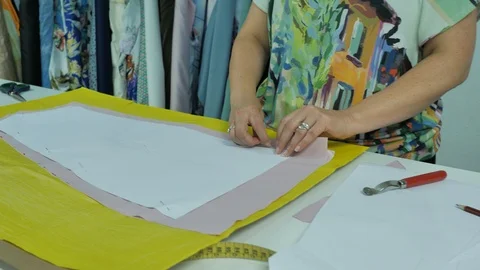 Master hands while sewing new clothes Stock Footage 94157950