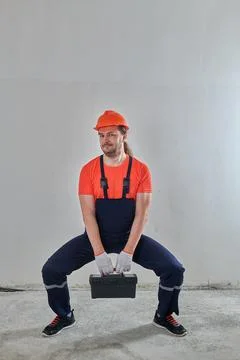 The master has a heavy tool case Stock Photos