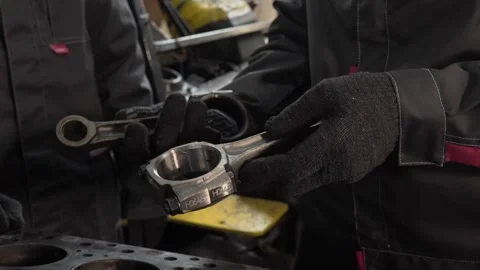 Master holds engine parts in his hands Stock Footage 270697541