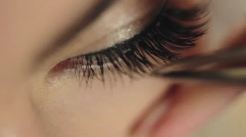 Master lash maker increases eyelashes for model Stock Footage 62403598