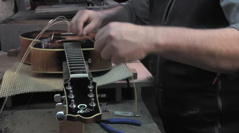 Master luthier guitars at work Video stock 60592079
