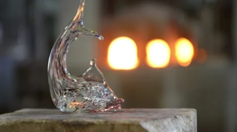 Master made dolphin Murano glass and sends it into the oven Stock Footage 52104777