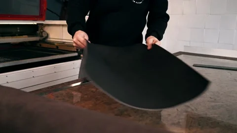 The master makes a cut for sewing a leather bag Stock Footage 151207819