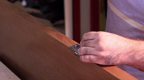 Master makes doors - hinge screwing Stock Footage 65470909