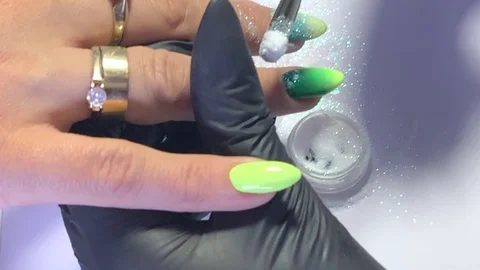 Master makes a manicure client. Hands - close-up. Stock Footage 107535471