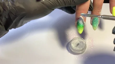 Master makes a manicure client. Hands - close-up. Stock Footage 107536294