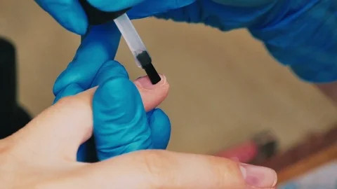 Master makes a manicure close-up Stock Footage 76705473