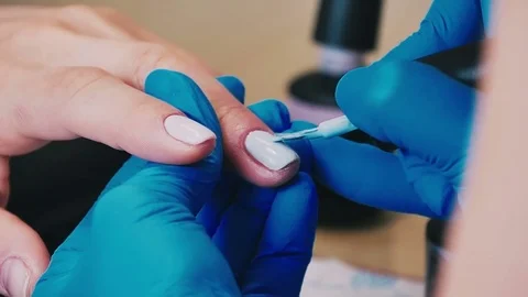 Master makes a manicure close-up Stock Footage 76709276