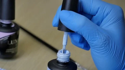 Master makes a manicure close-up Stock Footage 76709777