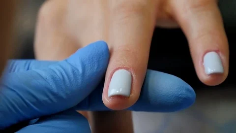 Master makes a manicure close-up Stock Footage 76711381