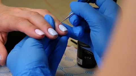 Master makes a manicure close-up Stock Footage 76714354