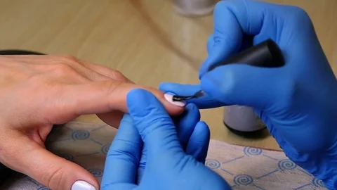 Master makes a manicure close-up Stock Footage 76715285