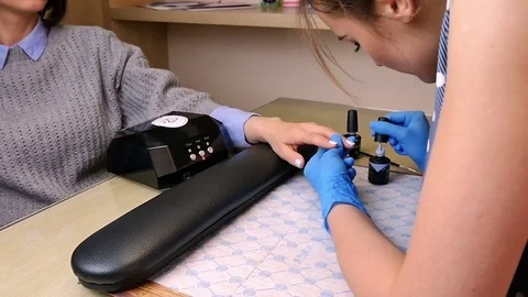 Master makes a manicure Stock Footage 76712033