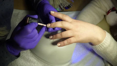 Master makes a manicure for nail care Stock Footage 236988863