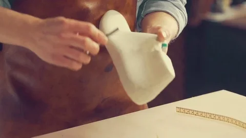 The master makes shoes in the workshop Stock Footage 76950927