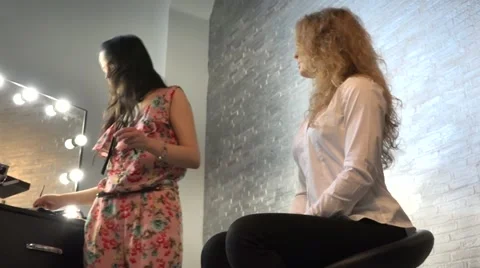 Master makeup admires his work. Stock Footage 64656937