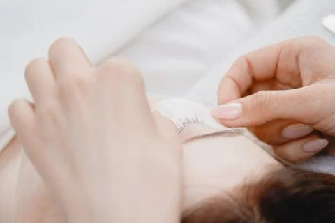 Master making fake set lash Eyelash extension procedure, work with patch for eye 스톡 사진