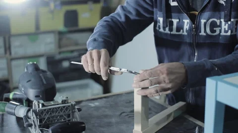 Master Measures the Board in the Workshop Stock Footage 60660966