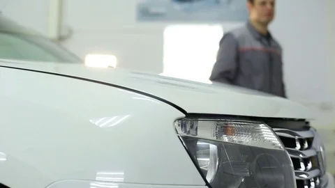 The master opens the hood and checks the engine Video stock 74375112