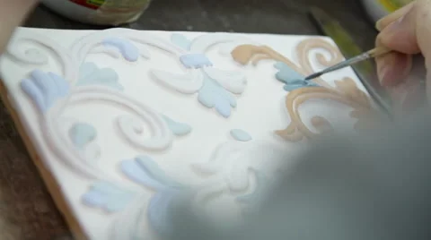 Master paints clay tiles Stock Footage 44219815