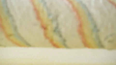 Master paints a wall with a roller in white. Office renovation and renovation Video stock 132792372