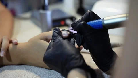 The master performs the procedure of hardware manicure. Stock Footage 165201210