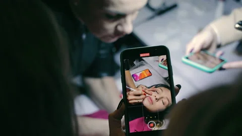 The master of permanent lip make-up demonstrates his work. A look at creating Stock Footage 192845211