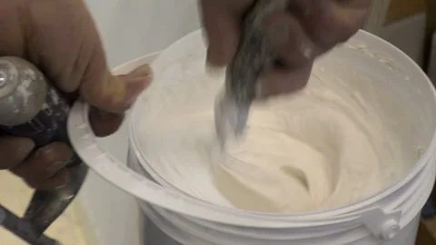 Master plasterer plaster in a bucket Stock Footage 147653805