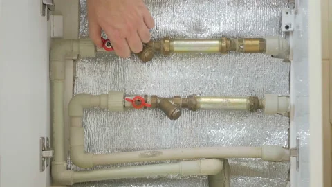 Master plumber opens the water tap. Stock Footage 125126711
