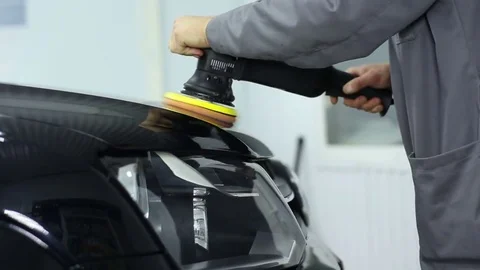 Master polishes the front of the body : the closeup and medium shot Stock Footage 74379115