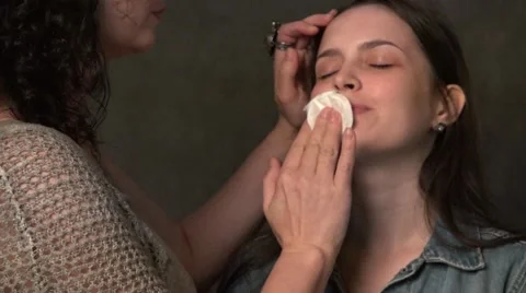 Master prepares the face for makeup. Stock Footage 64380749