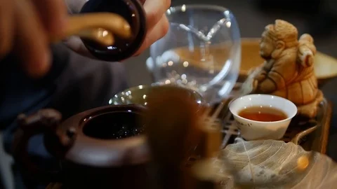 Master prepares a tea ceremony, chinese teapot, kettle. Stock Footage 107518540