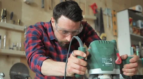 The master processes wood using machine Stock Footage 61814783