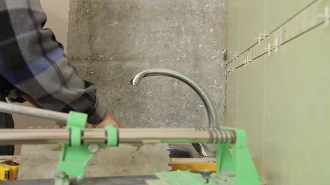 Master puts glue for tiles on the wall. Stock Footage 101685543