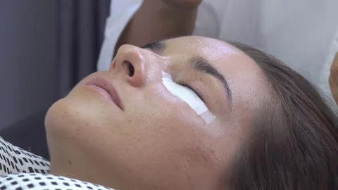 Master remove lashes. Preparation before eyelash extension in beauty studio. Stock Footage 75740841